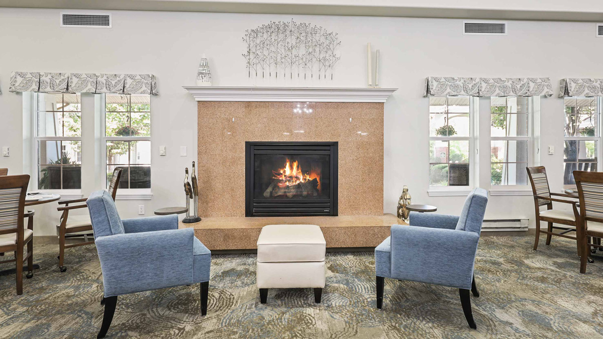 A cozy fireplace lounge at Southern Pines